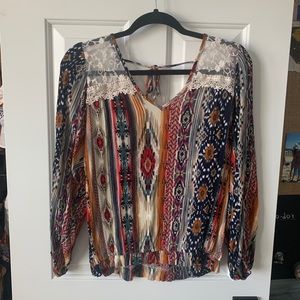 Whimsical and fun patterned long-sleeve blouse